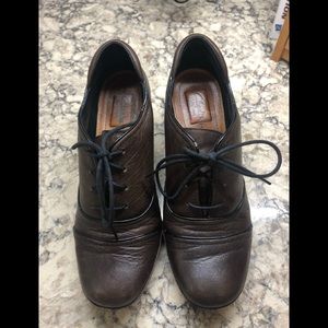 Clark’s brown artisan laced front bootie.